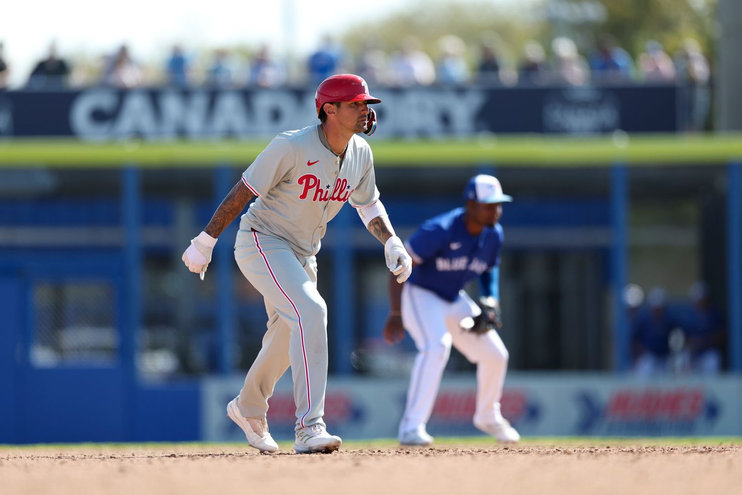 Mar 4, 2024; Dunedin, Florida, USA; Philadelphia Phillies right fielder Nick Castellanos (8) runs the bases against the Toronto Blue Jays in the sixth inning at TD Ballpark.